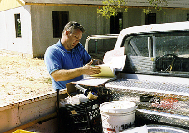 Ward Veith overseeing the construction of a new house for William and Sherri Steele